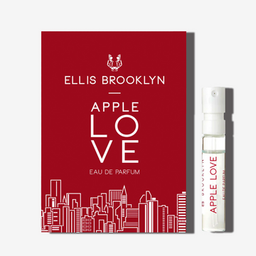 Apple Love 1.5ml Eau De Parfum Vial next to red Apple Love Eau De Parfum vial holder card. | english_image
