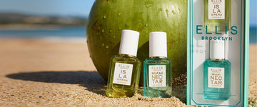 ISLA SIRENA Eau de Parfum 7.5ml and MIAMI NECTAR Eau de Parfum 7.5ml lean against a green coconut on a beach next to ISLA TIME Gift Set box which contains ISLA SIRENA Eau de Parfum 7.5ml and MIAMI NECTAR Eau de Parfum 7.5ml.