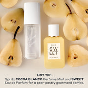 A white frosted COCOA BLANCO 90ml Perfume Mist bottle and a yellow SWEET 50ml Eau de Parfum bottle arranged next to each other on a light neutral background with sliced pear pieces around them with text at the bottom reading 