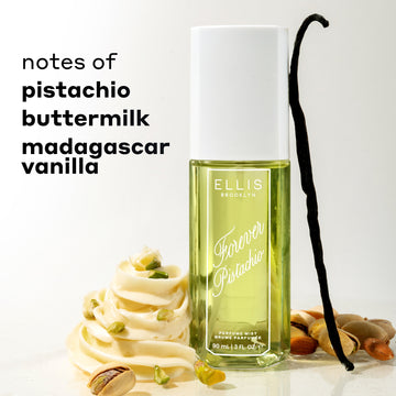 FOREVER PISTACHIO Perfume Mist 90ml between white icing, pistachios, and a vanilla bean against a white background with black text that reads 