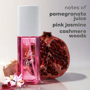 LOVE POM Perfume Mist 90ml between white flower, pomegranate juice, wood, and half of a pomegranate against white background with gray text that reads 