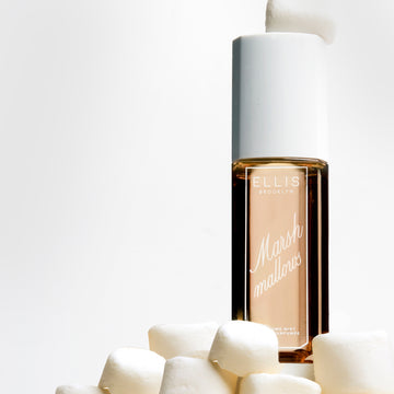 MARSHMALLOWS 240ml Perfume Mist on pile of marshmallows with marshmallow on top of cap on white background