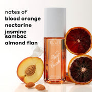 NEW CRUSH Perfume Mist 90ml between sliced blood oranges, sliced nectarine, white flower petal and almonds against white background with black text that reads 