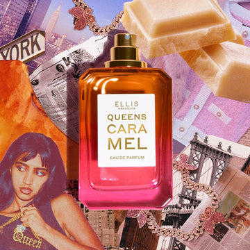 QUEENS CARAMEL Eau de Parfum 50ml without cap on collage of NYC skyline, newspapers, white chocolate, pink and gold rhinestone butterfly necklaces, pink and white sweater, caramel, bridge, and woman with black hair wearing a black tank top holding a gold necklace that says 