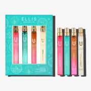 FIRST CLASS Gift Set containing GUAVA GRANITA Eau de Parfum 10ml, MIAMI NECTAR Eau de Parfum 10ml, QUEENS CARAMEL Eau de Parfum 10ml, and VANILLA SALT Eau de Parfum 10ml on a white background