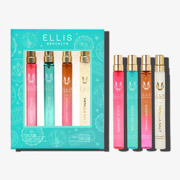 Coffret cadeau FIRST CLASS contenant GUAVA GRANITA Eau de Parfum 10ml, MIAMI NECTAR Eau de Parfum 10ml, QUEENS CARAMEL Eau de Parfum 10ml et VANILLA SALT Eau de Parfum 10ml sur fond blanc