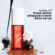 FIRST DATE Perfume Mist 90ml next to whipped cream, a spoon leaning against the bottle, a stack of 2 dates and whipped cream on date syrup with black text that reads 