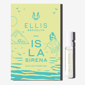 ISLA SIRENA Eau de Parfum 1.5ml vial next to green ISLA SIRENA vial holder card with blue drawn images of birds, a mountain, a mermaid sitting on a rock, water ripples, and the Ellis Brooklyn literary lion logo and blue text that reads 'Ellis Brooklyn ISLA SIRENA Eau de Parfum' | english_image