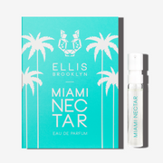 Flacon de 1,5 ml de Miami Nectar Eau de Parfum à côté de la carte porte-flacon bleu sarcelle de Miami Nectar Eau de Parfum.