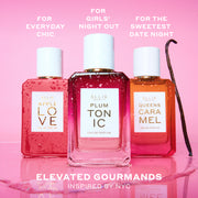 APPLE LOVE Eau de Parfum 50ml, PLUM TONIC Eau de Parfum 50ml, and QUEENS CARAMEL Eau de Parfum 50ml covered in water droplets next to vanilla bean and on top of water puddle on pink background with white text that reads 