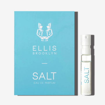Petit flacon de parfum Salt 1,5 ml à côté de la carte porte-flacon bleu Salt Eau de Parfum.