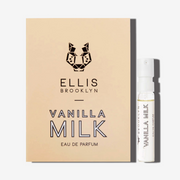 Vanilla Milk 1.5ml Eau De Parfum Vial next to beige Vanilla Milk Eau De Parfum vial holder card.