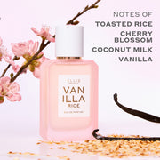 VANILLA RICE Eau de Parfum 50ml next to toasted rice, vanilla beans, and pink sakura blossoms on a pink background with gray text that reads 