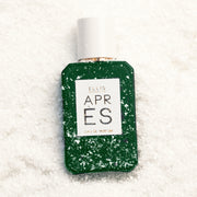 Apres 50ml Eau De Parfum in snow with snow lightly covering bottle.