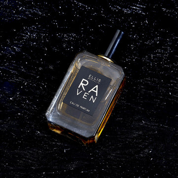 Raven 50ml Eau De Parfum on black glittery fabric.