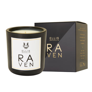 Raven 6.5 oz. Terrific Scented Candle in front of black and grey Raven 6.5 oz. Terrific Scented Candle box, on white background.