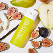 Sun Fruit Golden Glistening Scented Body Oil 95ml with pears, figs, coconut, and a vanilla bean on white background.